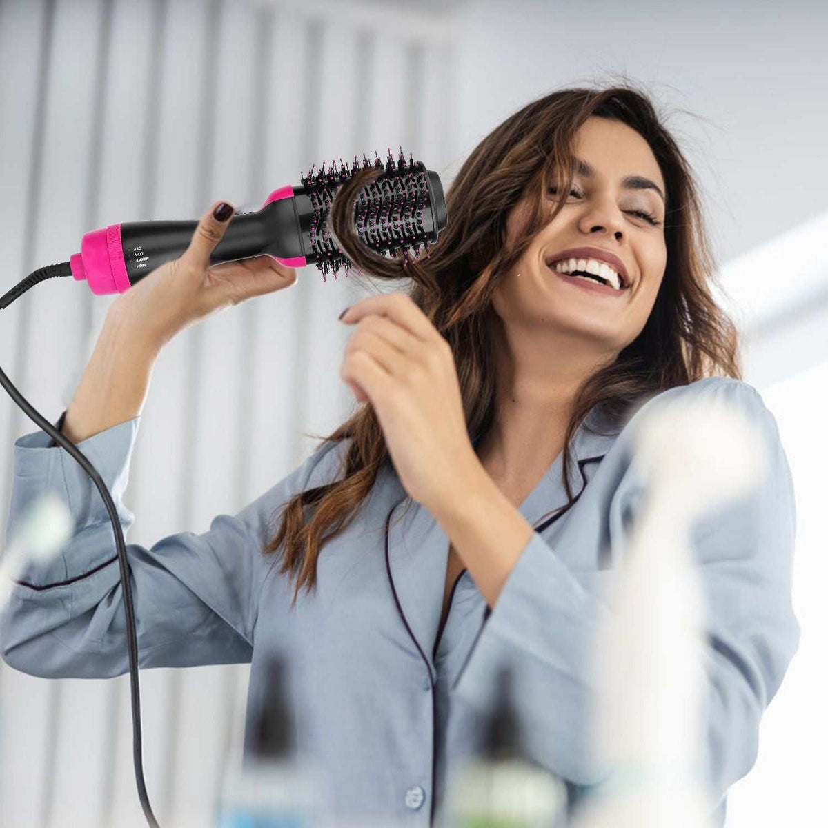 4-in-1 multi-function hot hair brush and dryer with ball-tipped bristles