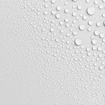 All-Natural Rose Pillow & Linen Spray water droplets on smooth translucent surface showing condensation texture