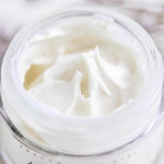 Anti-aging grass-fed tallow face cream jar with natural oils and probiotics