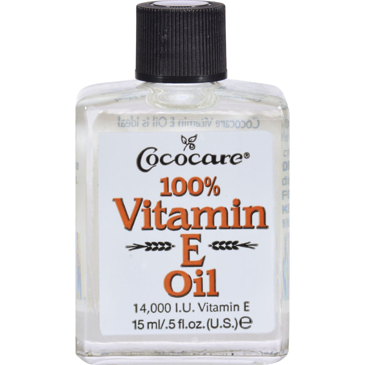 Cococare Vitamin E Oil in a small clear rectangular bottle with black cap, containing transparent liquid vitamin E oil.