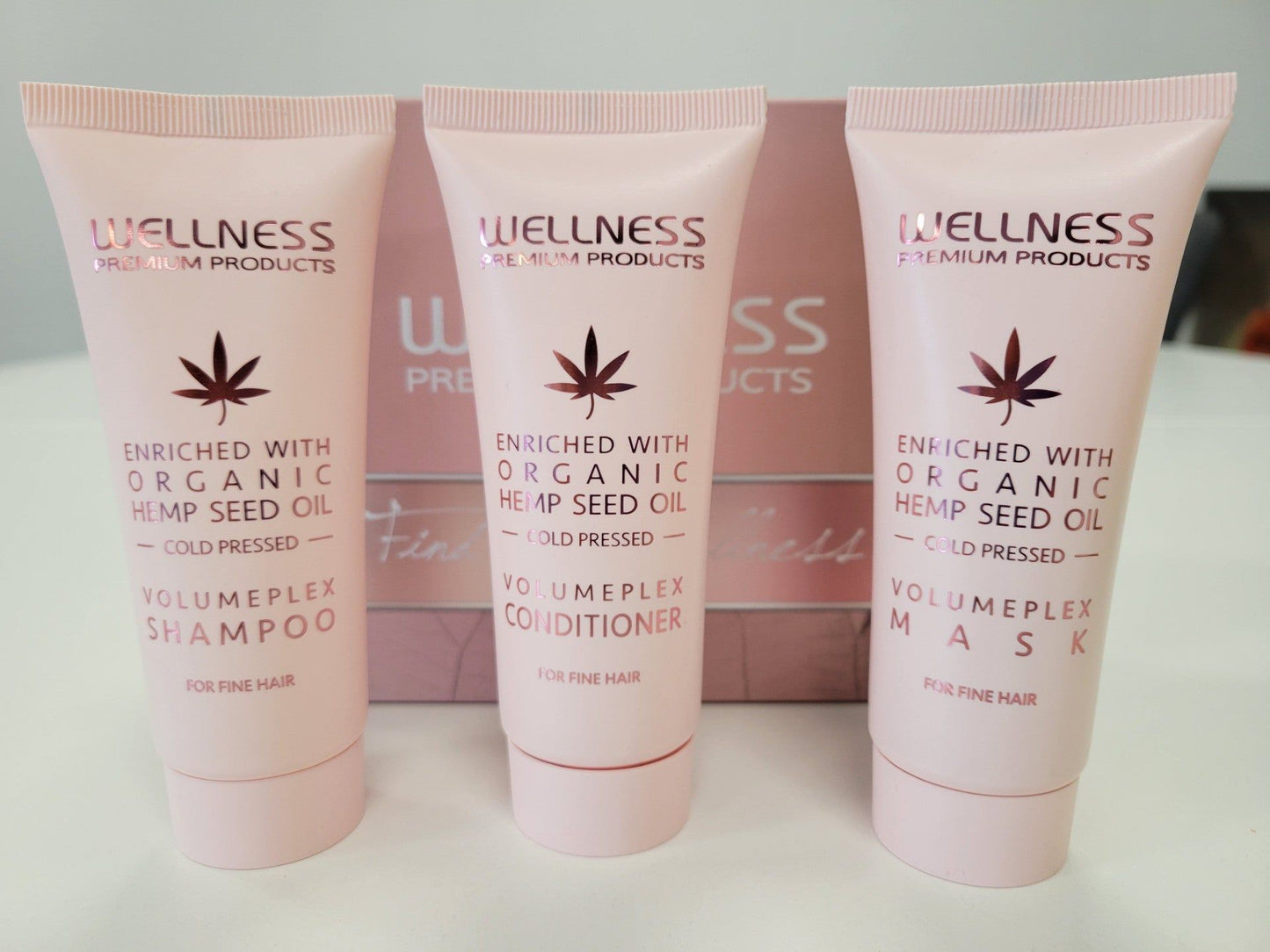 Volumeplex Triple Travel Set featuring travel-size shampoo, conditioner, and mask enriched with organic hemp seed oil for fine hair, perfect for effortless hair care on the go.