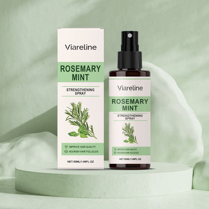 VIARELINE Rosemary Mint Infused Leave-In Hair Spray for All Hair Types - 50 ml against a soft green backdrop.