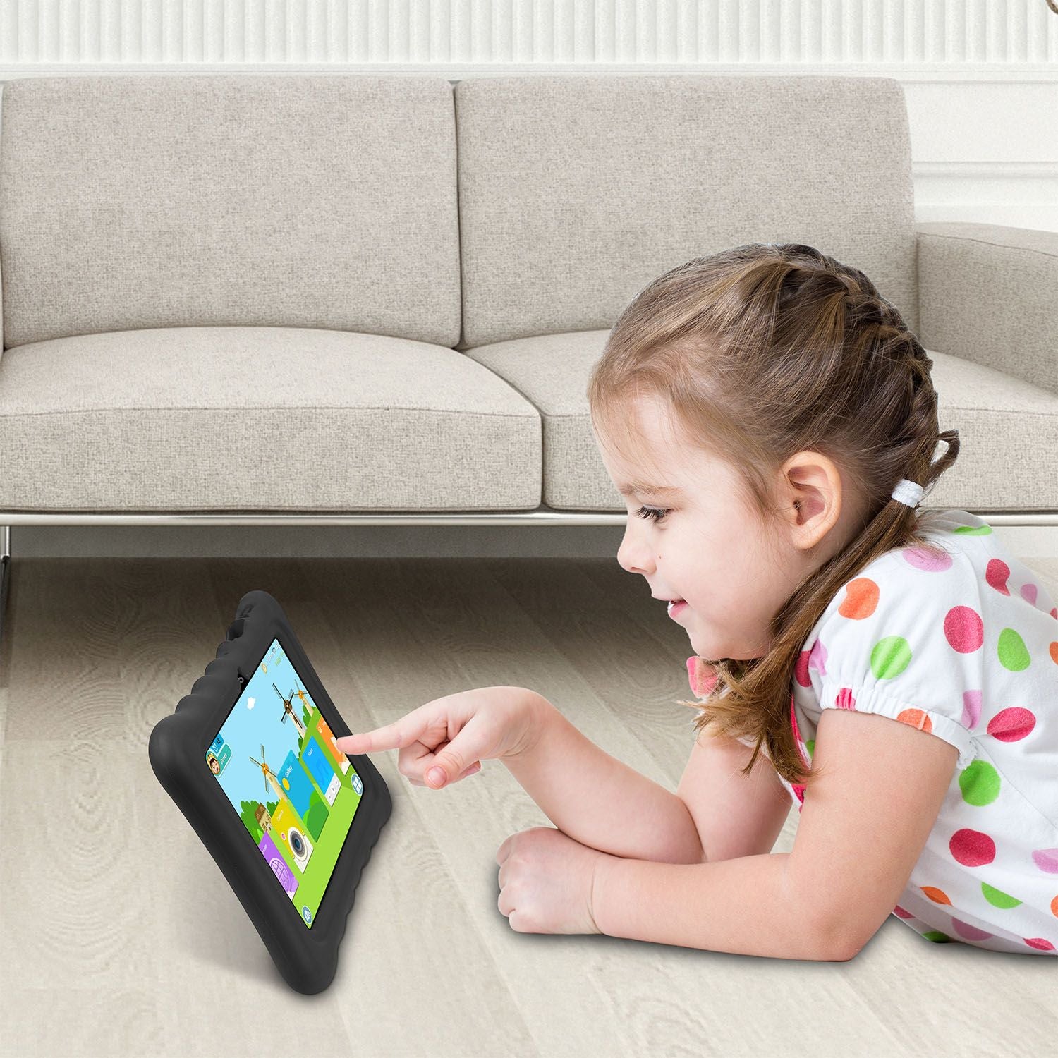 Girl using a 7-inch tablet in a shock-resistant silicone case with stand, enjoying interactive content.