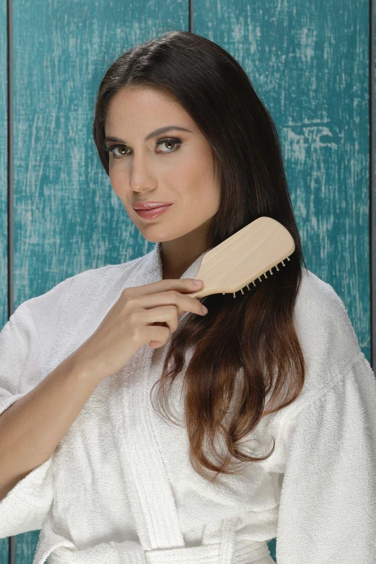 Eco-friendly bamboo paddle brush with natural wooden bristles and rubber cushion