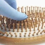 Eco-friendly bamboo paddle hairbrush with natural wooden bristles