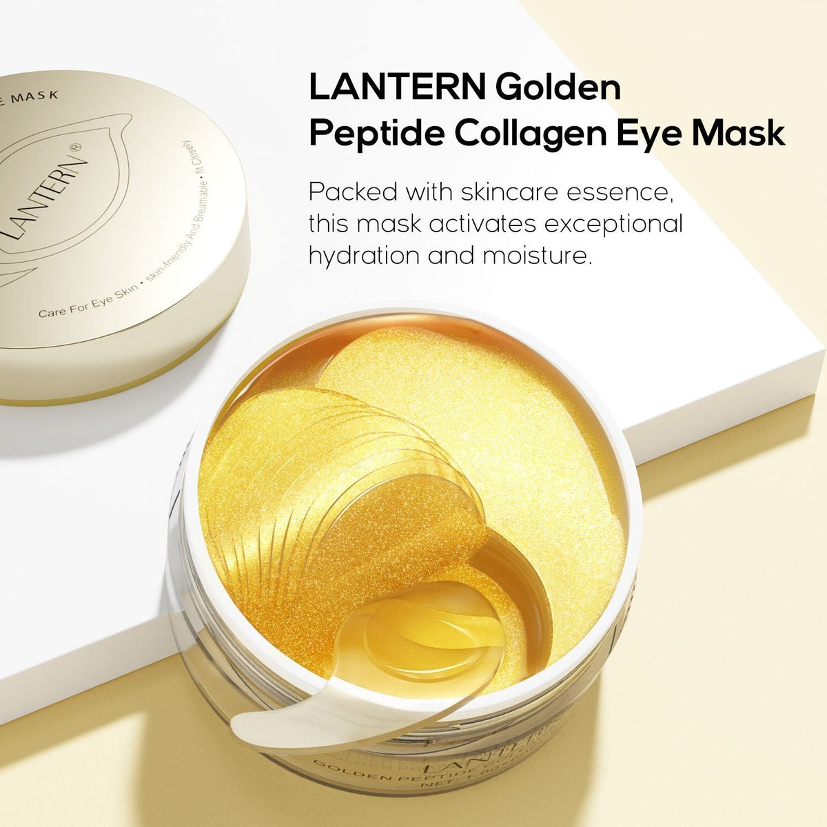 Golden Peptide Collagen eye patches in shimmering gold hydrogel arranged in a white round container with a spatula on a white surface