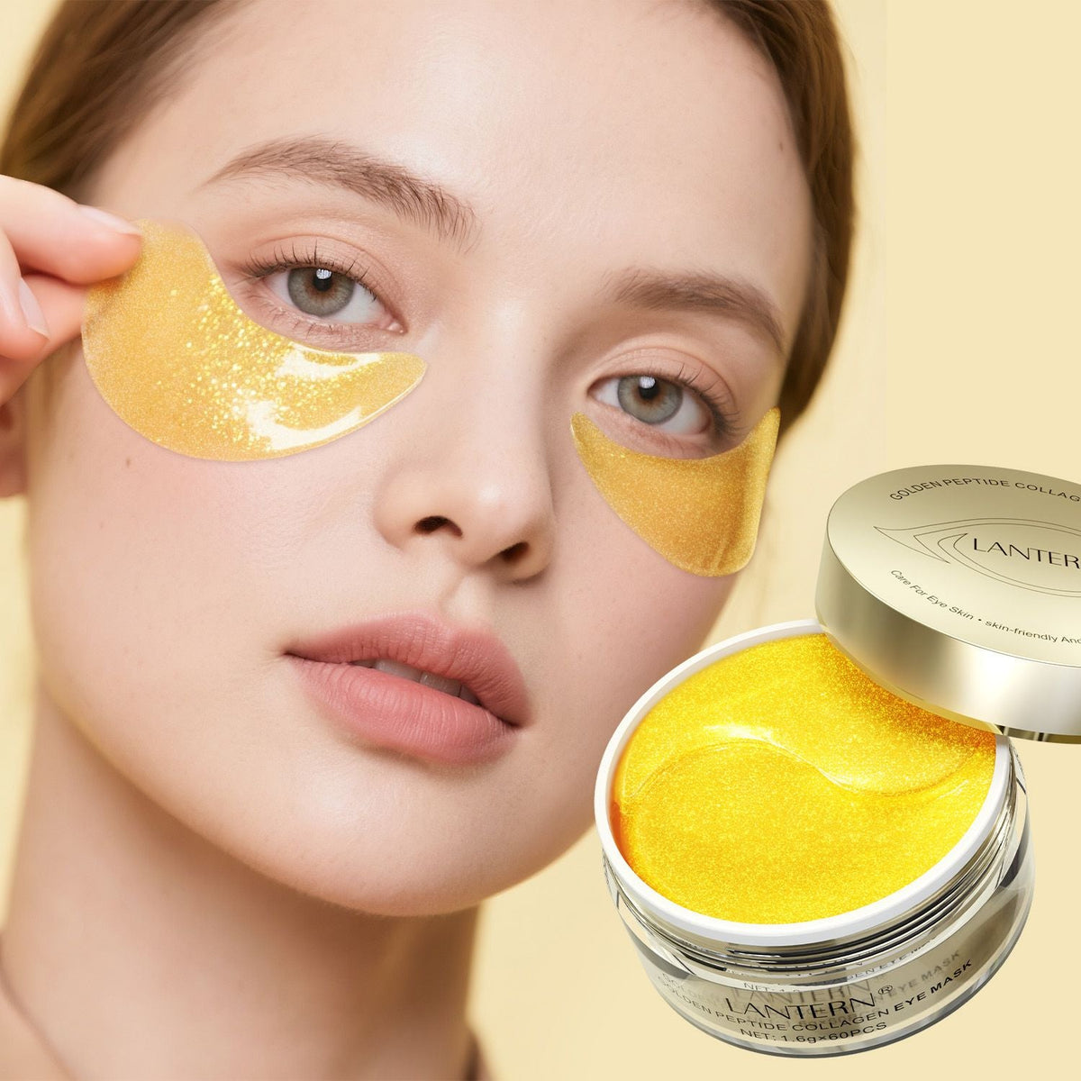 Golden Peptide Collagen hydrogel eye patches in shimmering gold worn under eyes on woman with smooth skin, with open jar of patches