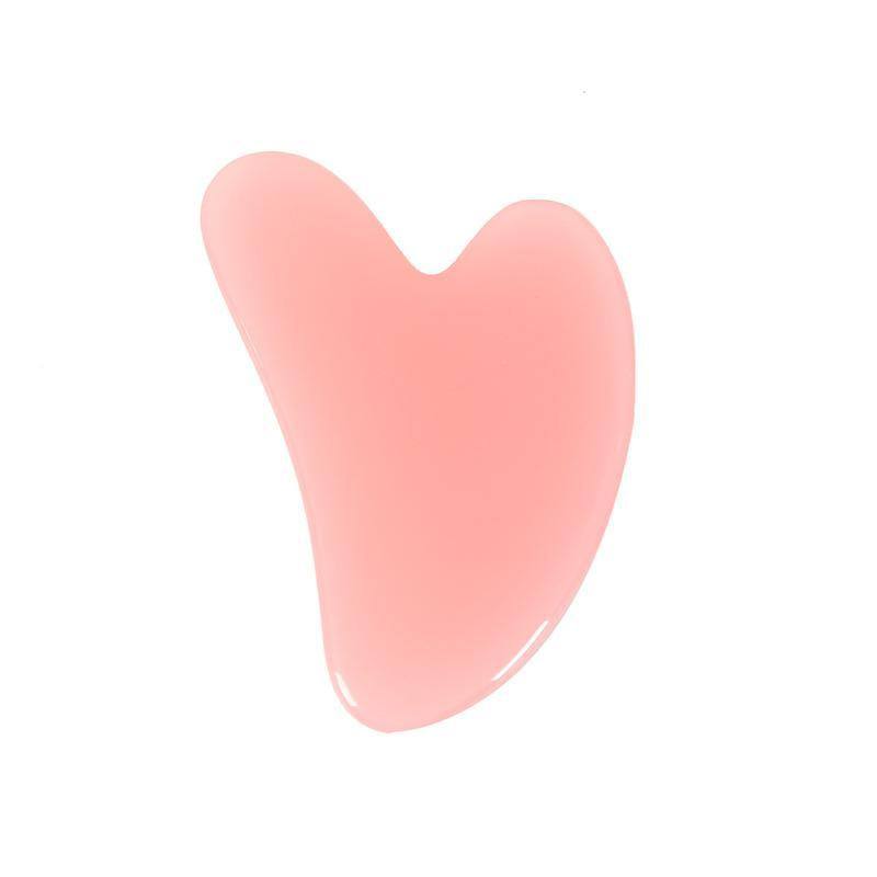 heart-shaped rose quartz gua sha tool for facial massage and contouring