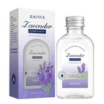 Intimate Bliss Vegan Aromatherapy lavender massage oil in clear glass bottle with silver cap and purple-themed box featuring lavender illustration