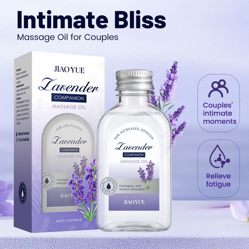Clear glass bottle and lavender purple boxed packaging of Intimate Bliss Vegan Aromatherapy lavender massage oil with floral accents and silver cap.