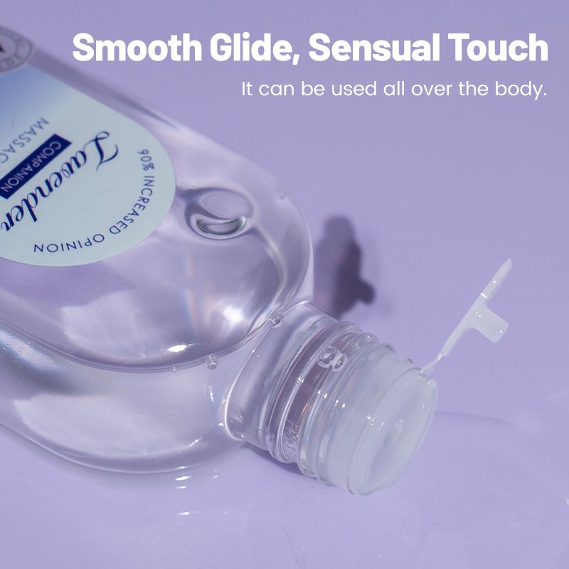 Intimate Bliss Vegan Aromatherapy clear lavender massage oil in clear plastic bottle with flip cap on purple surface