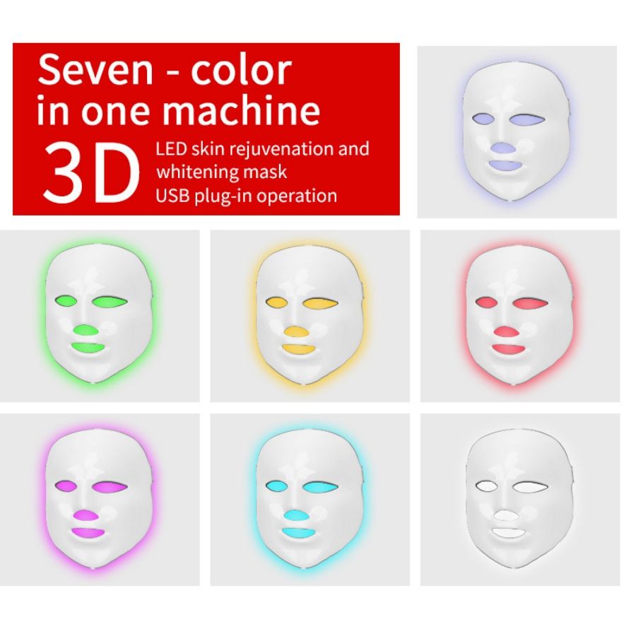 Light Therapy LED Face Mask showing seven color options including green, yellow, red, purple, blue, white, and violet glowing around a white facial mask with eye and mouth openings