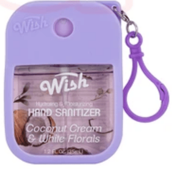 Hand sanitizer in purple silicone holder with keychain, labeled Wish Coconut Cream & White Florals scent
