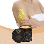 Revitalizing Beef Tallow honey balm in dark jar with creamy yellow moisturizer applied on woman's arm, soothing skincare product