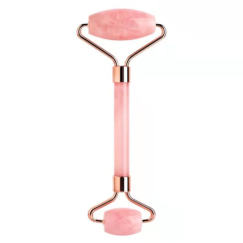 Rose Quartz Facial Roller with double-sided polished pink rose quartz stones and rose gold metal frame for facial massage