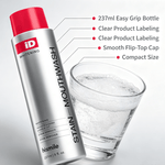 Stain Removing Mouthwash in sleek silver 237ml bottle with red cap and clear labeling shown with a glass of mouthwash rinse