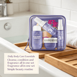Travel Body Care Set in purple pouch including tropical scented shower oil, body butter, and fragrance spray bottles