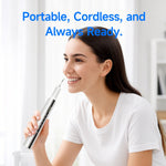 Ultrasonic Teeth Cleaner in sleek silver handheld design used by woman with long dark hair wearing white t-shirt