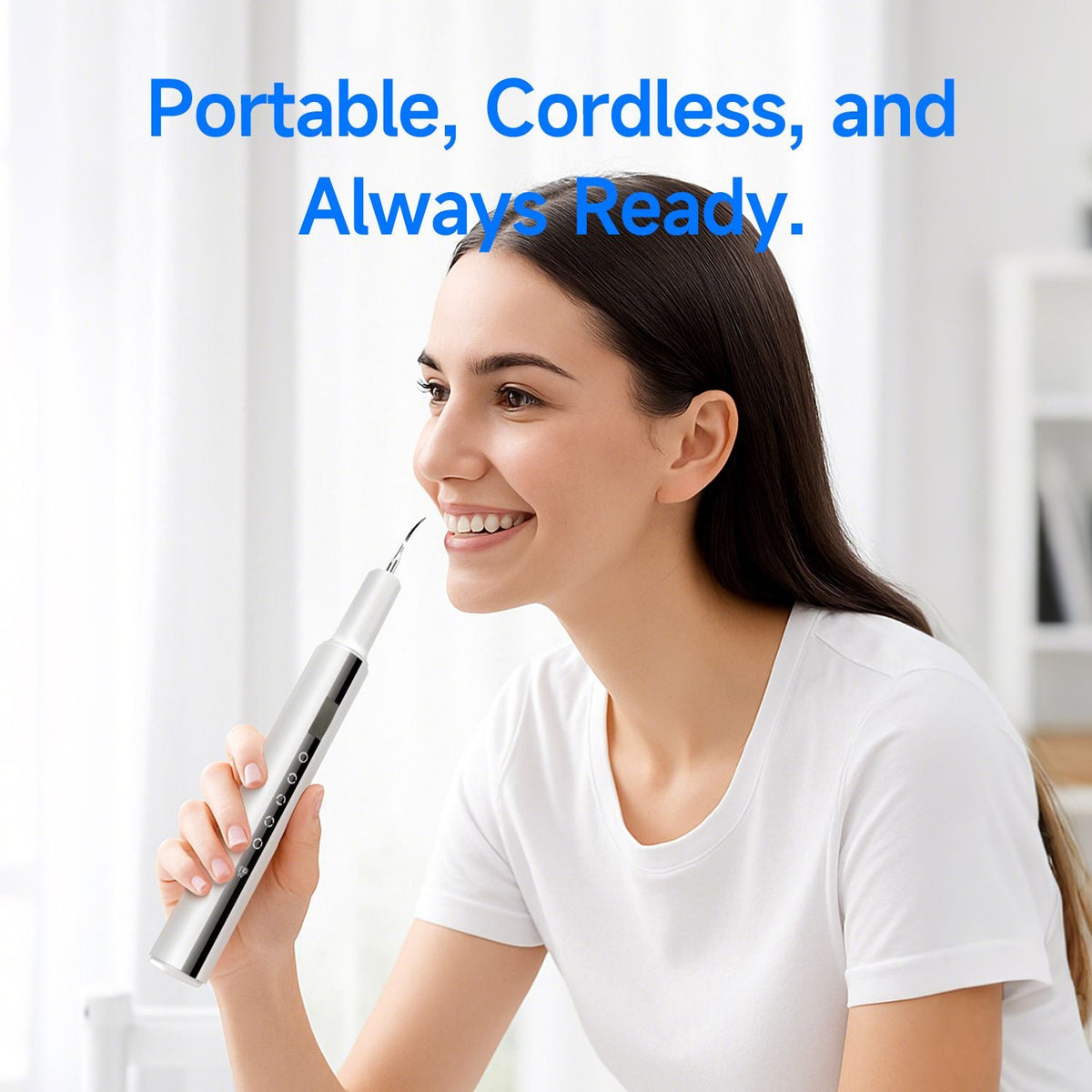 Ultrasonic Teeth Cleaner in sleek silver handheld design used by woman with long dark hair wearing white t-shirt