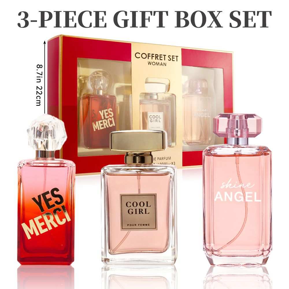 Women's Fragrance Set with three pink and clear glass Eau de Parfum spray bottles labeled Yes Merci, Cool Girl, and Shine Angel in a red gift box